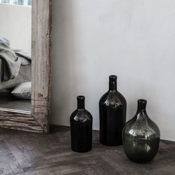 "With this brown bottle vase called Bottle from House Doctor